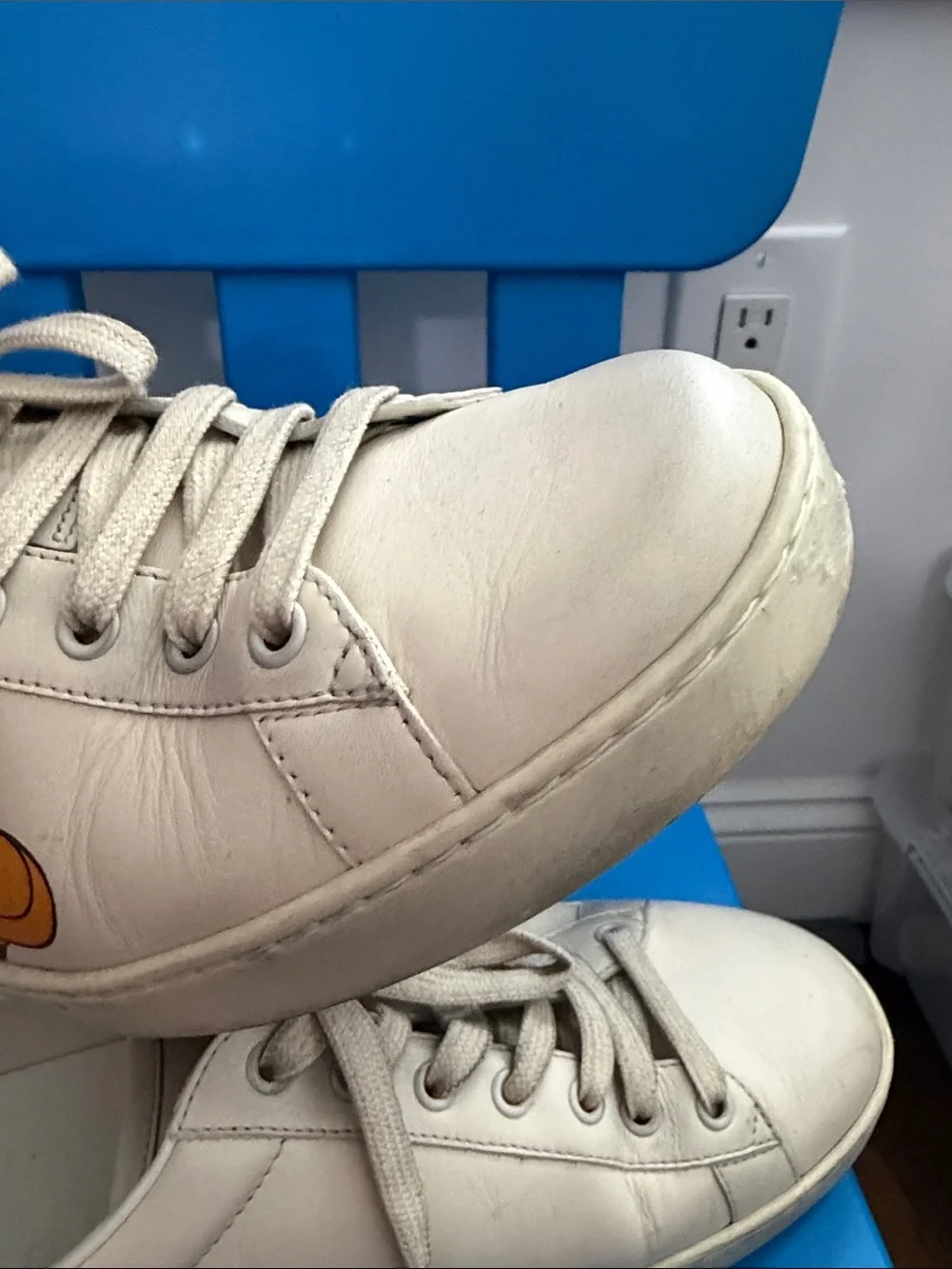 Gucci White Mickey Mouse Sneakers with Red Heel Accent